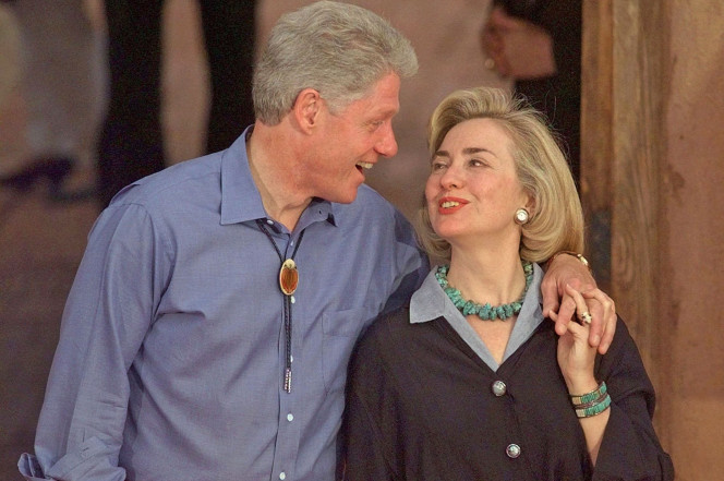 Bill and Hillary Clinton share a laugh in 1997.Photo- AP